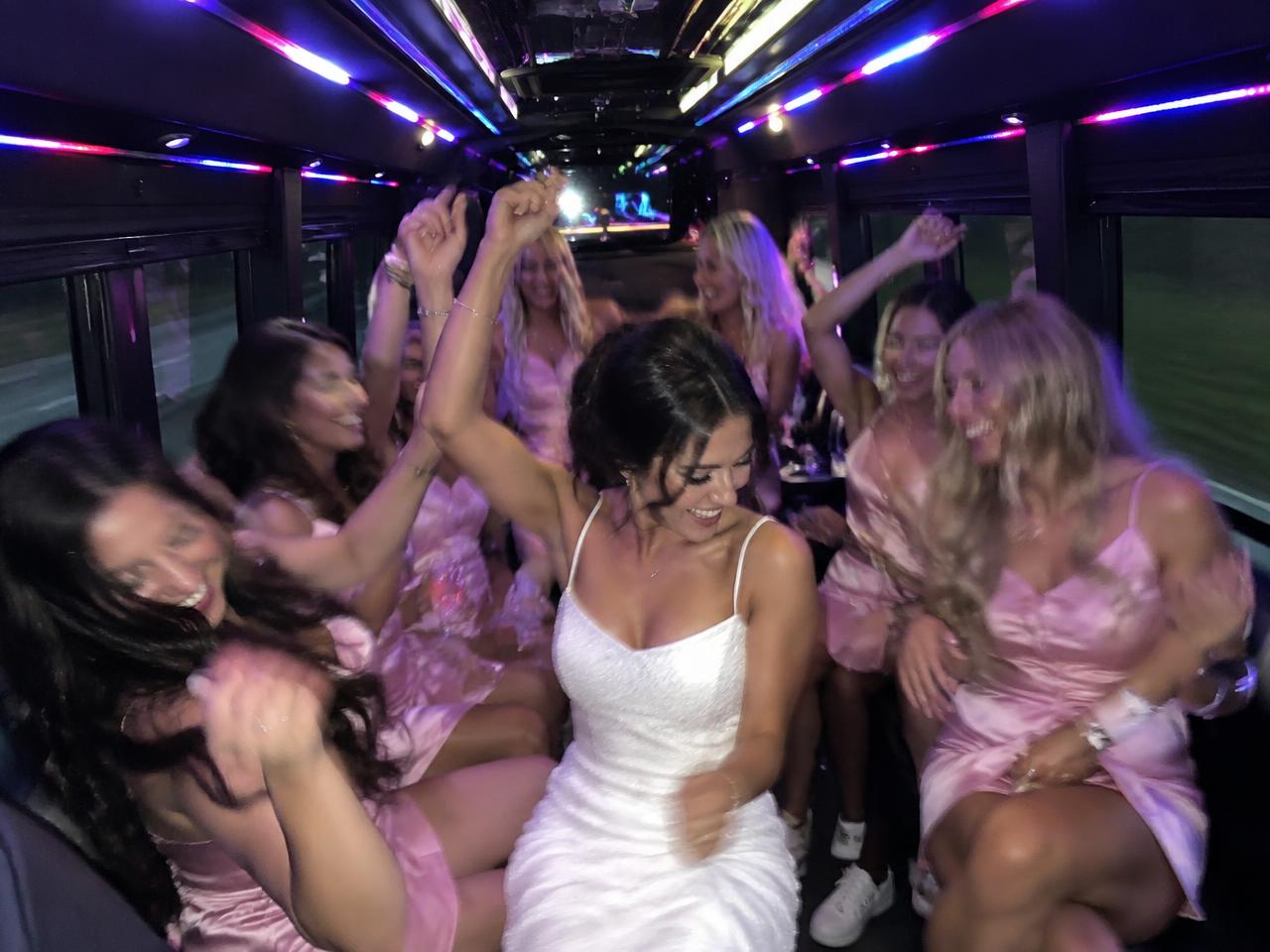 Bachelorette group dancing inside the limo