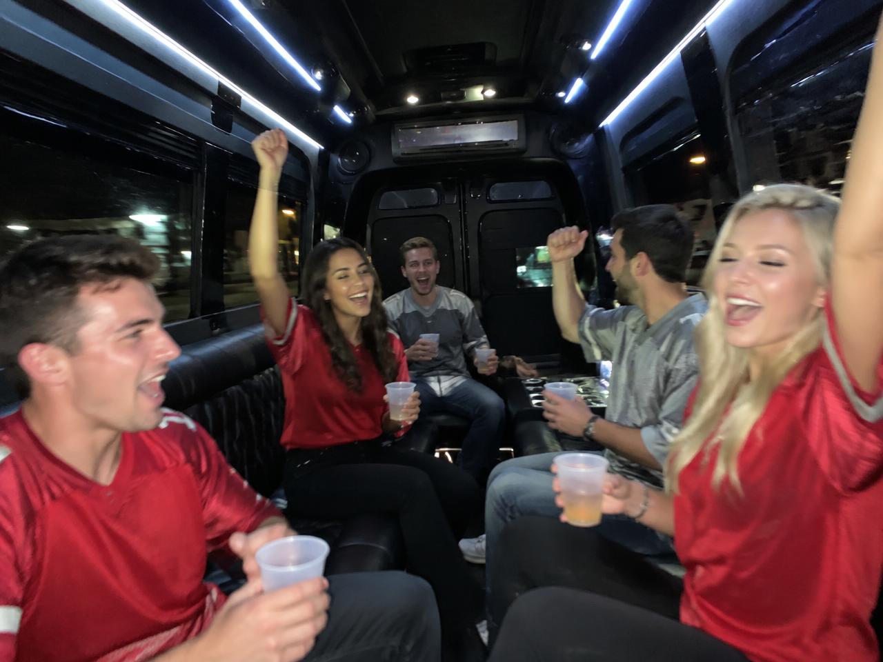 Fans cheering inside the Sprinter limo on the way to the stadium